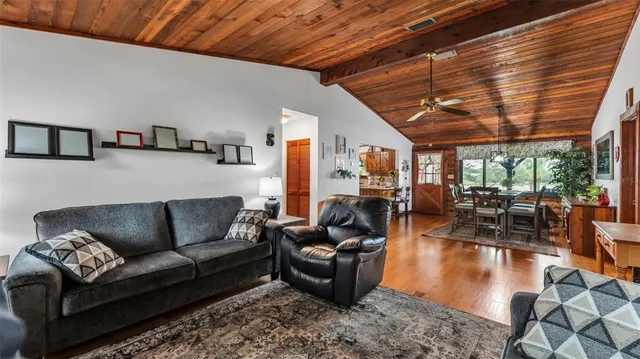 a kitchen that has a sink and a stove in it