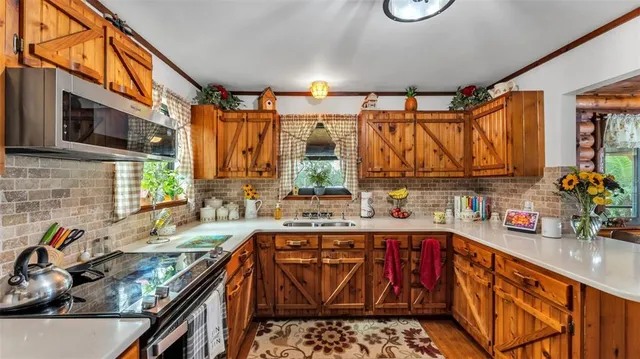 a bed room with a bed and a flat screen tv