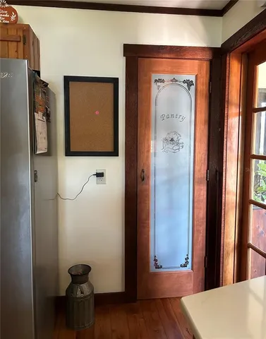 a kitchen with a sink appliances and a counter top space