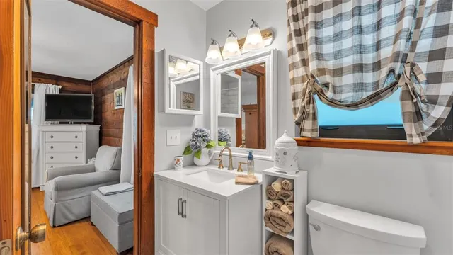a view of livingroom with furniture and a window