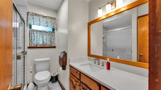 a bed room with a bed and a couch