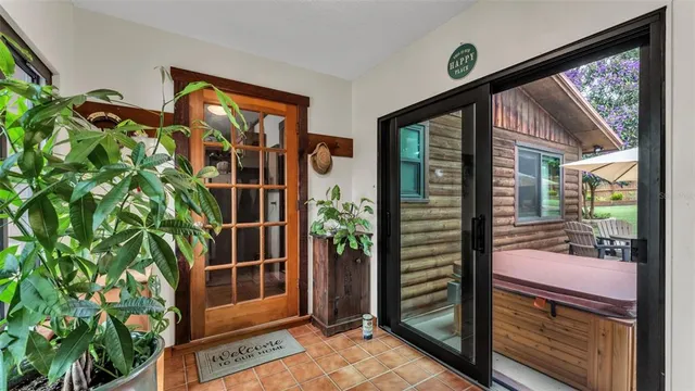 a house view with a sitting space and garden