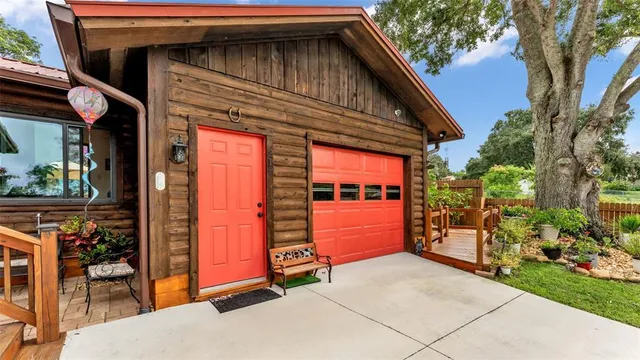 a view of a backyard with sitting area