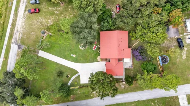 $395,000 | 219 East Lake Menzie Boulevard, Dundee, FL 33838