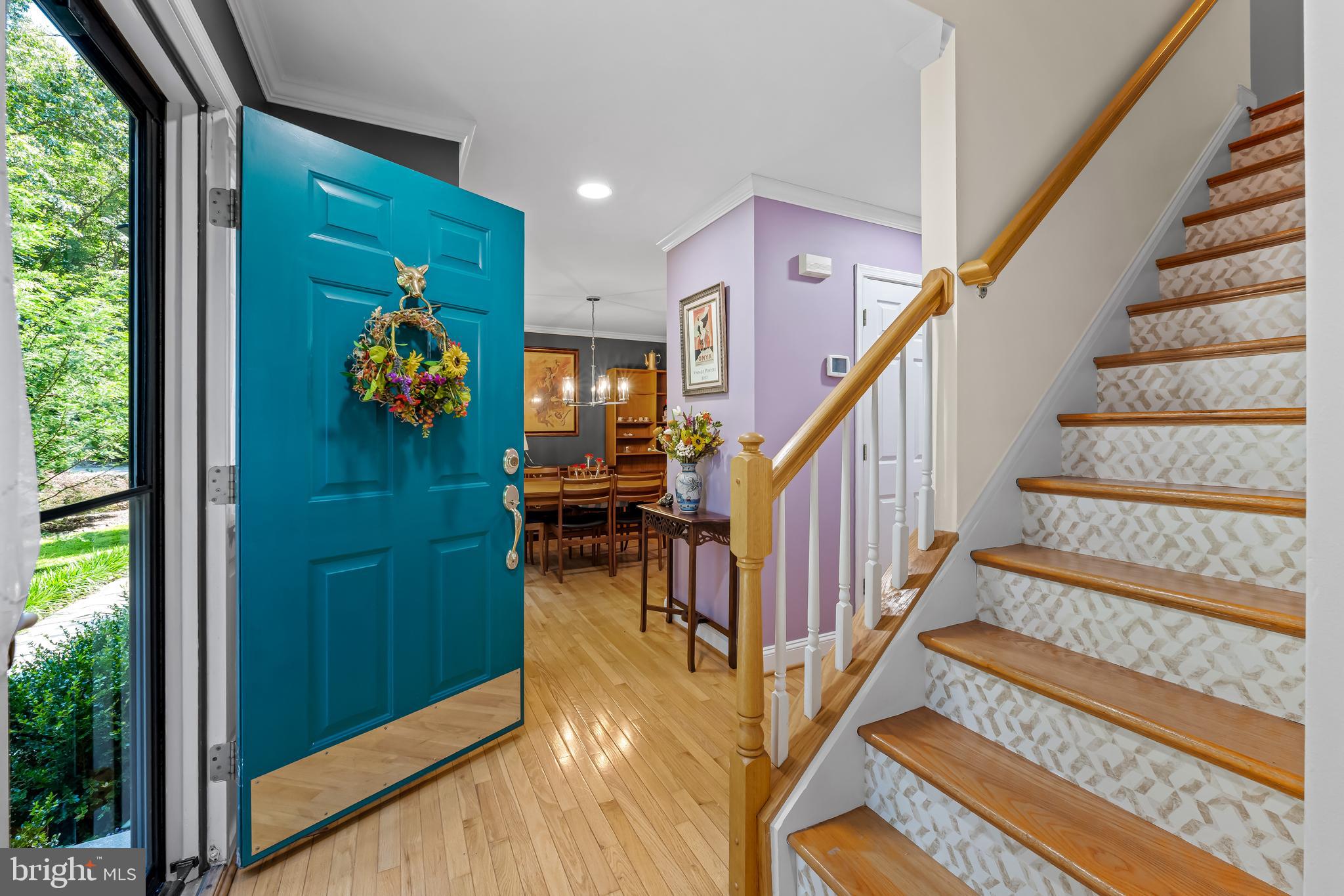 5026 Mt Carmel Road Hampstead, MD 21074 - Photo 5 of 57 a view of entryway with wooden floor and stairs