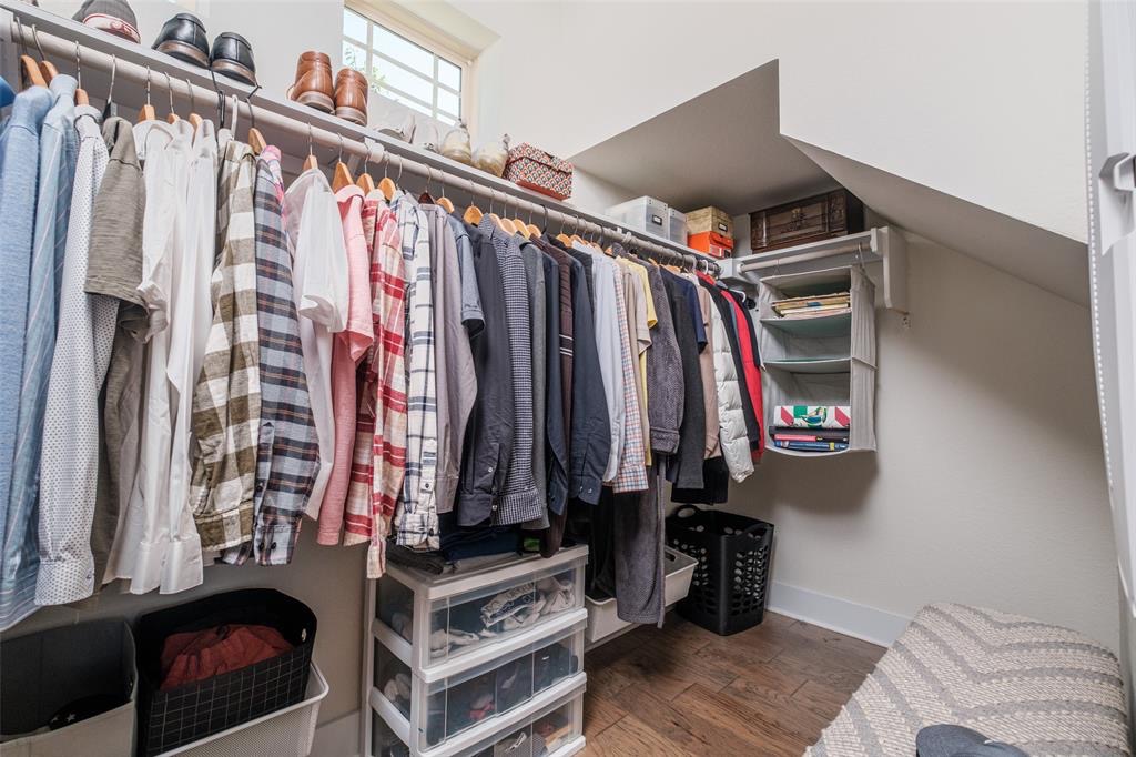 1724 Rowdy Loop Leander, TX 78641 - Photo 14 of 32 Walk in closet featuring dark wood-style floors