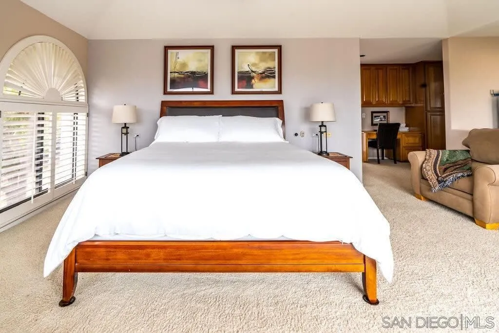 2110 Locust Street San Diego, CA 92106 - Photo 19 of 48 a spacious bedroom with bed and window