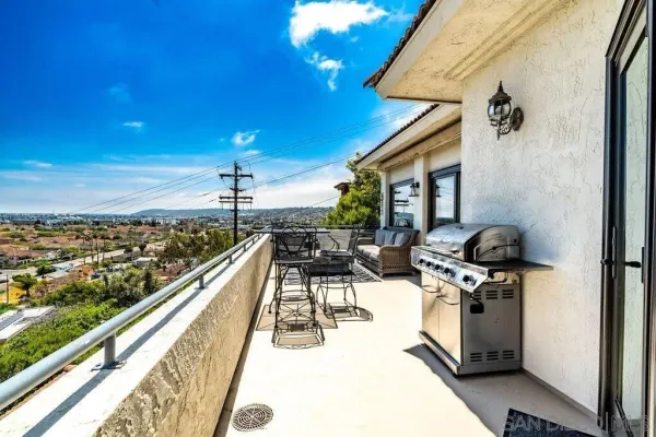 a view of a chairs and table in the terrace