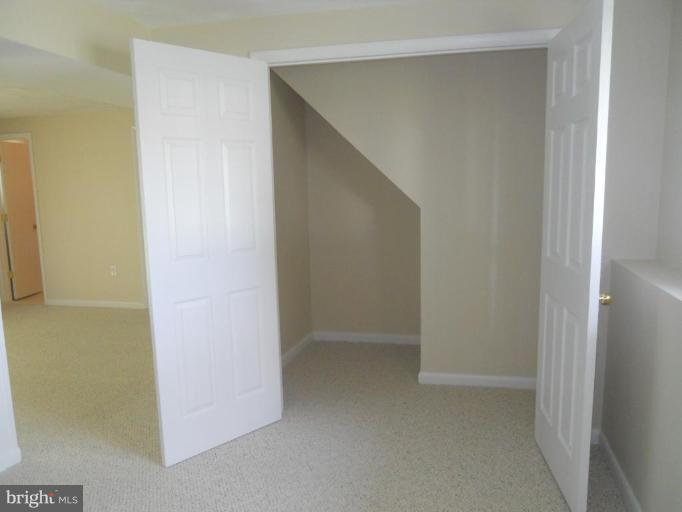 8820 Sigrid Road Randallstown, MD 21133 - Photo 14 of 23 a view of an empty room