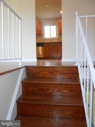 8820 Sigrid Road Randallstown, MD 21133 - Photo 19 of 23 a view of an entryway with wooden floor