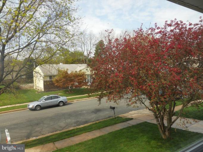 8820 Sigrid Road Randallstown, MD 21133 - Photo 7 of 23 a car parked on the side of the road