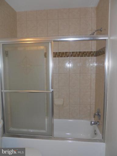 8820 Sigrid Road Randallstown, MD 21133 - Photo 8 of 23 a bathroom with a shower