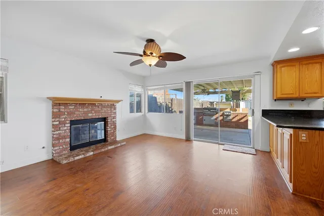 a kitchen with stainless steel appliances a stove a sink and a refrigerator