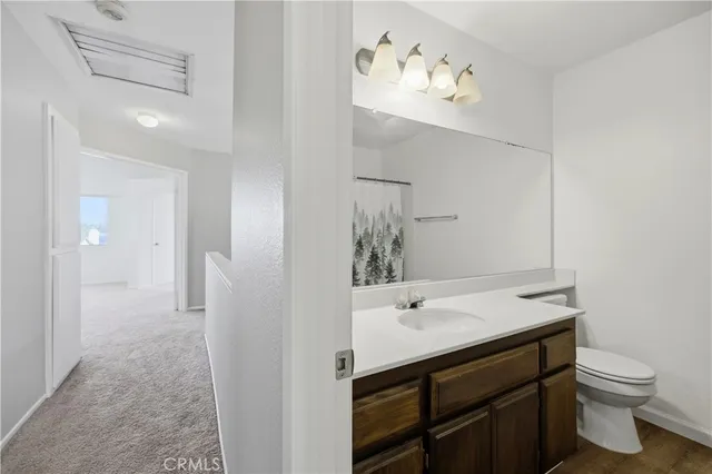 a view of a swimming pool with a yard