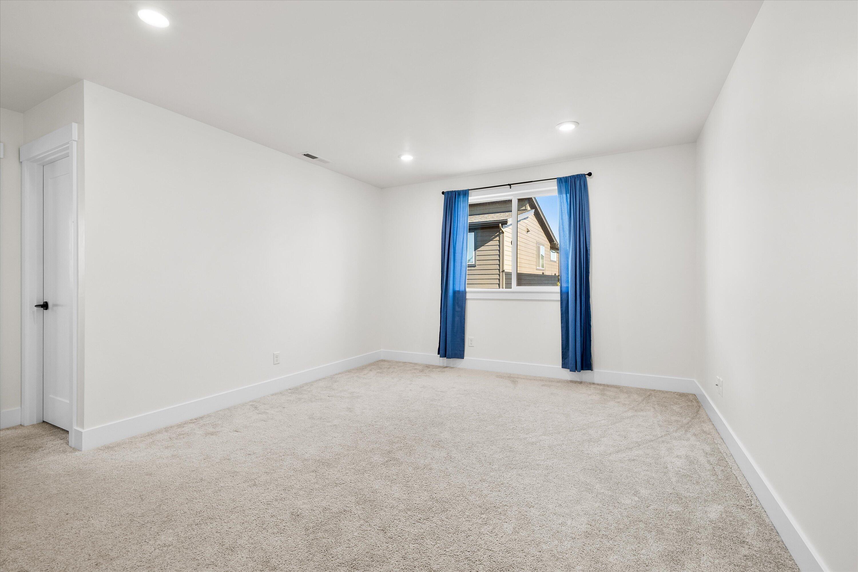 60903 Southeast Epic Place Bend, OR 97702 - Photo 21 of 48 an empty room with windows