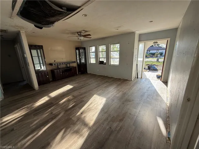 a view of gallery with wooden floor
