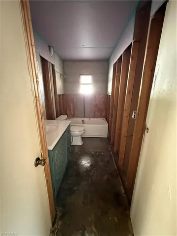 a bathroom with sink and mirror