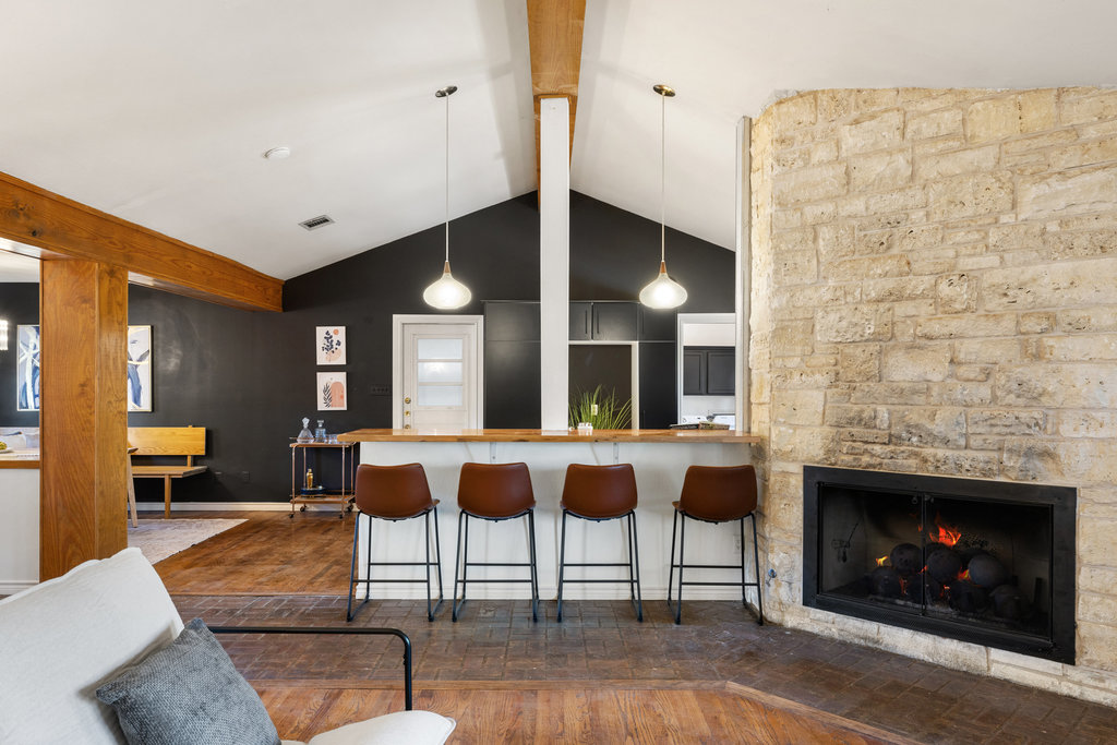 2008 Matthews Lane Austin, TX 78745 - Photo 14 of 36 The open flow from living to kitchen keeps everyone connected, whether you’re cooking, entertaining, or just hanging out