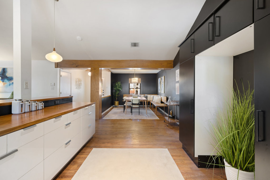 2008 Matthews Lane Austin, TX 78745 - Photo 17 of 36 The open flow to the dining room makes everything feel connected, whether it’s a casual weeknight meal or a long table full of friends, the space moves and feels like one big conversation