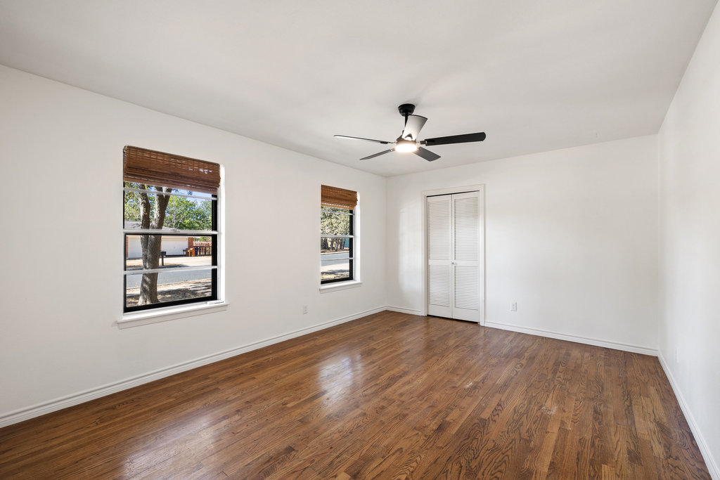 2008 Matthews Lane Austin, TX 78745 - Photo 28 of 36 Spacious and inviting, these rooms keep the home’s warm tone and timeless feel, perfect for guests or everyday living