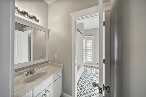 a bathroom with a bathtub and shower