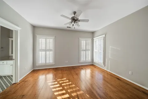 a view of a porch with wooden floor