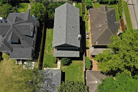 an aerial view of a house with garden