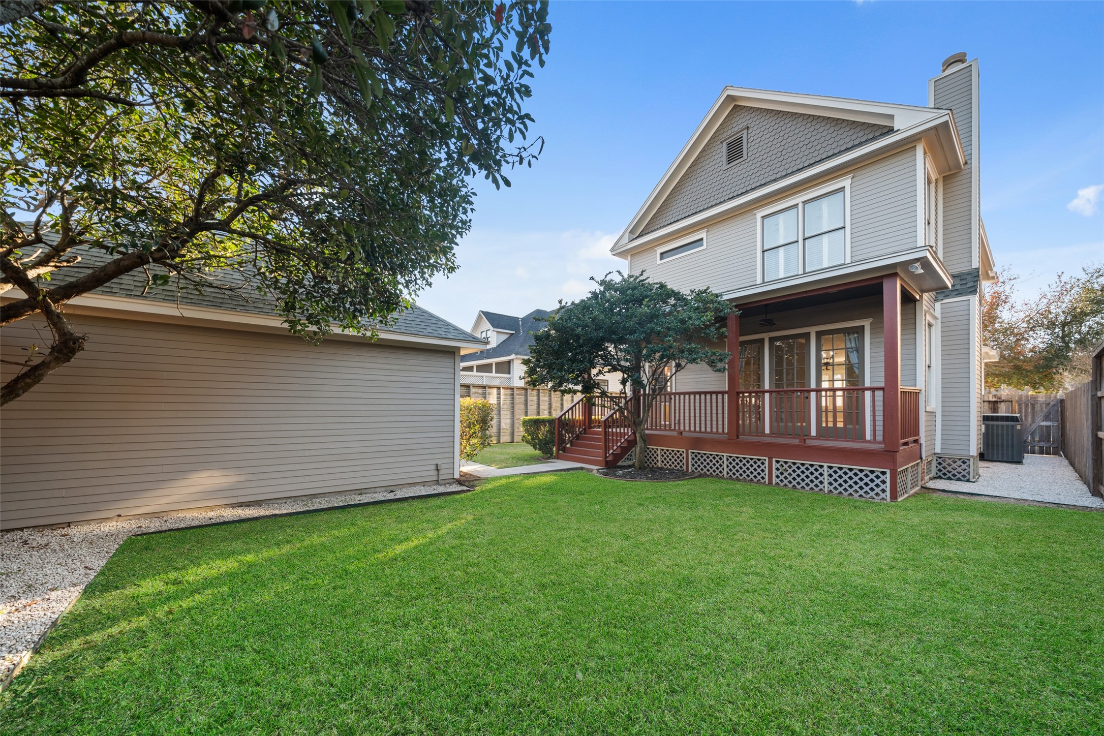 1342 Allston Street Houston, TX 77008 - Photo 31 of 39 Spacious backyard with mature trees and access to the covered porch and detached garage.