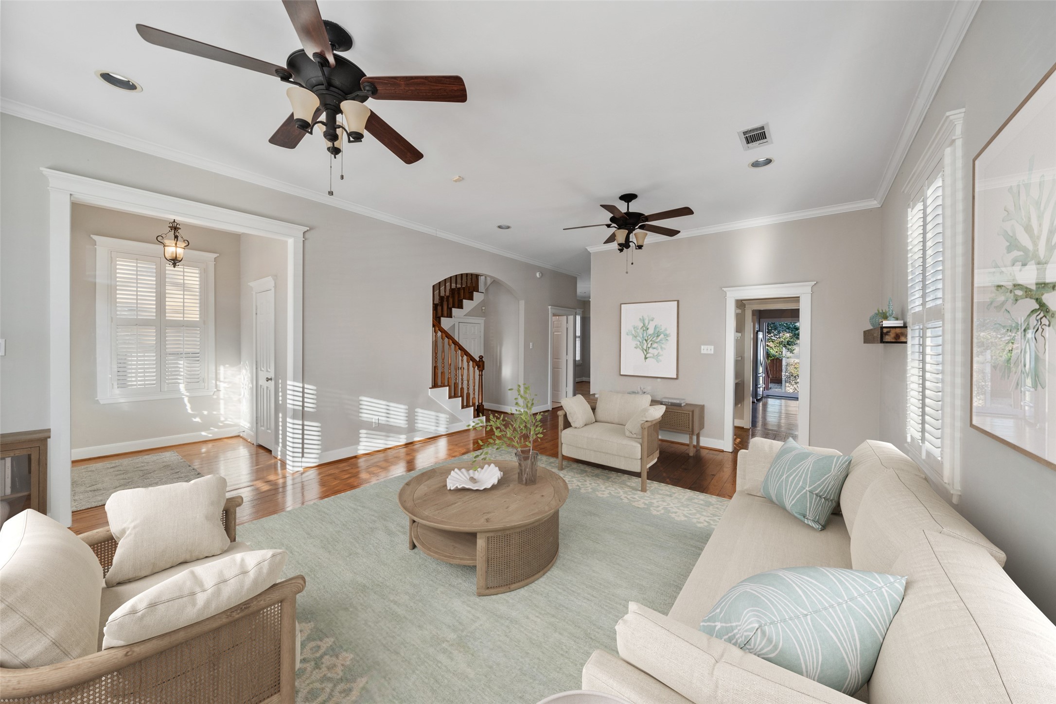 1342 Allston Street Houston, TX 77008 - Photo 5 of 39 Light-filled living with tall ceilings, hardwood floors, and plantation shutters throughout. (virtually staged)