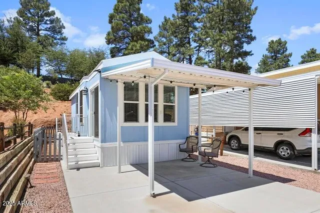 a view of a car park in front of house