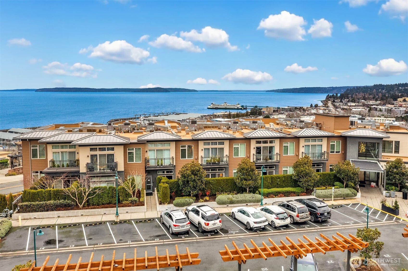 50 Pine Street, Unit 404 Edmonds, WA 98020 - Photo 31 of 33 a view of a patio with swimming pool table and chairs