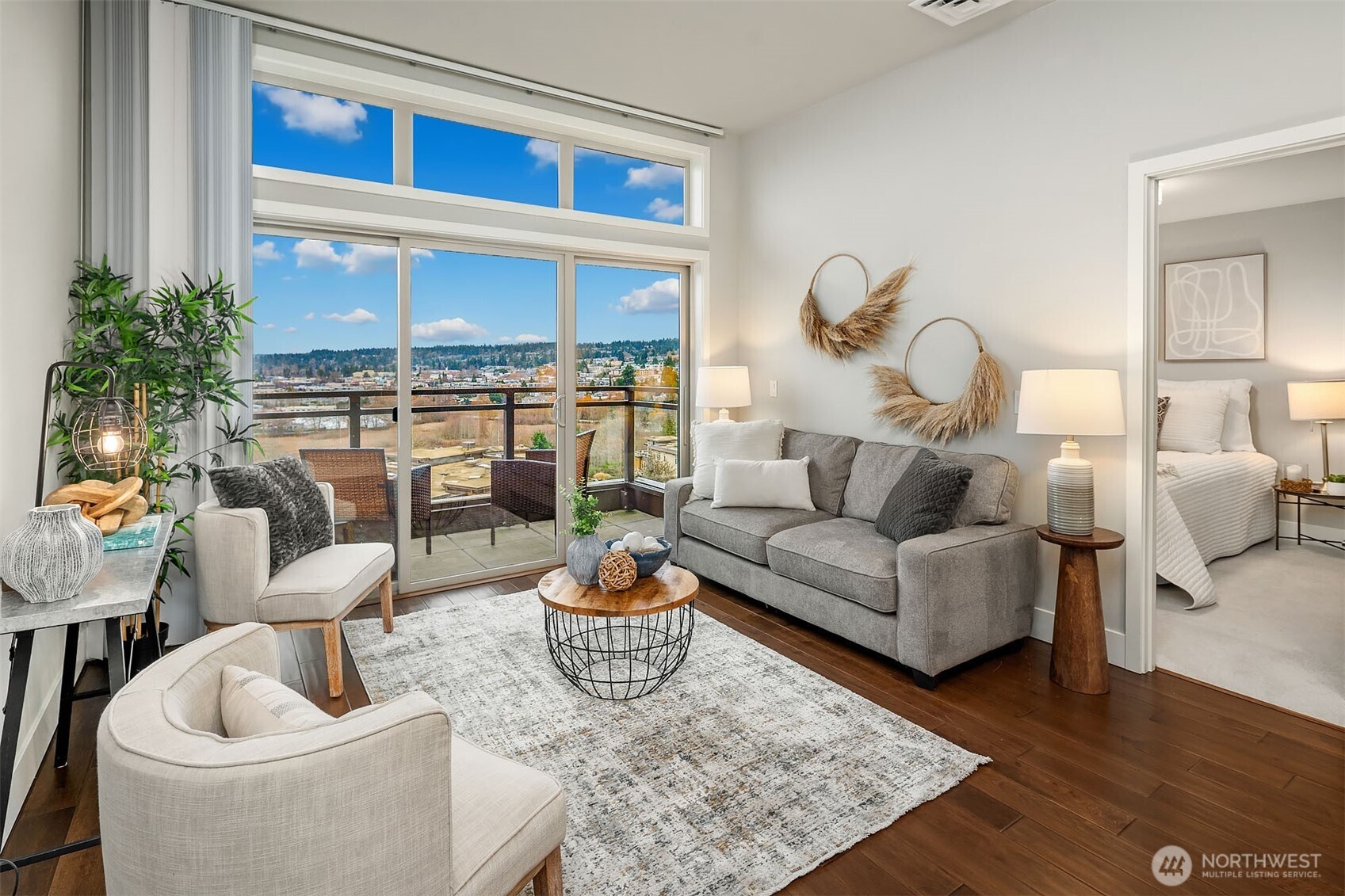 50 Pine Street, Unit 404 Edmonds, WA 98020 - Photo 8 of 33 a living room with furniture and a large window