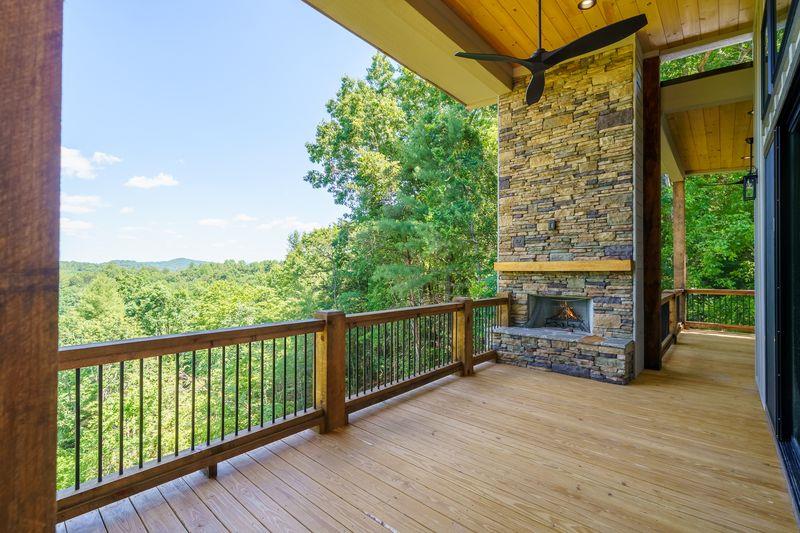 216 Old Orchard Road Ellijay, GA 30536 - Photo 43 of 59 a view of a balcony with wooden floor