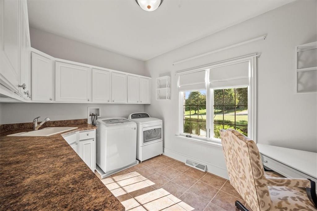 312 Cambridge Drive Mars, PA 16046 - Photo 13 of 50 a kitchen with a stove a sink and a window