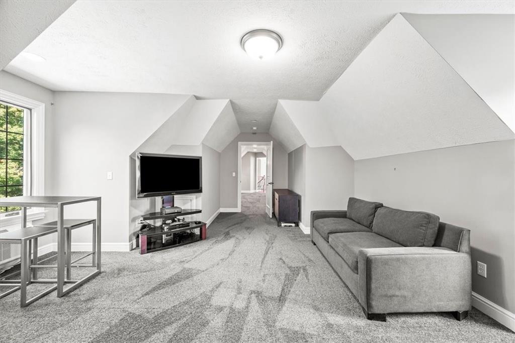 312 Cambridge Drive Mars, PA 16046 - Photo 29 of 50 a living room with furniture and a flat screen tv