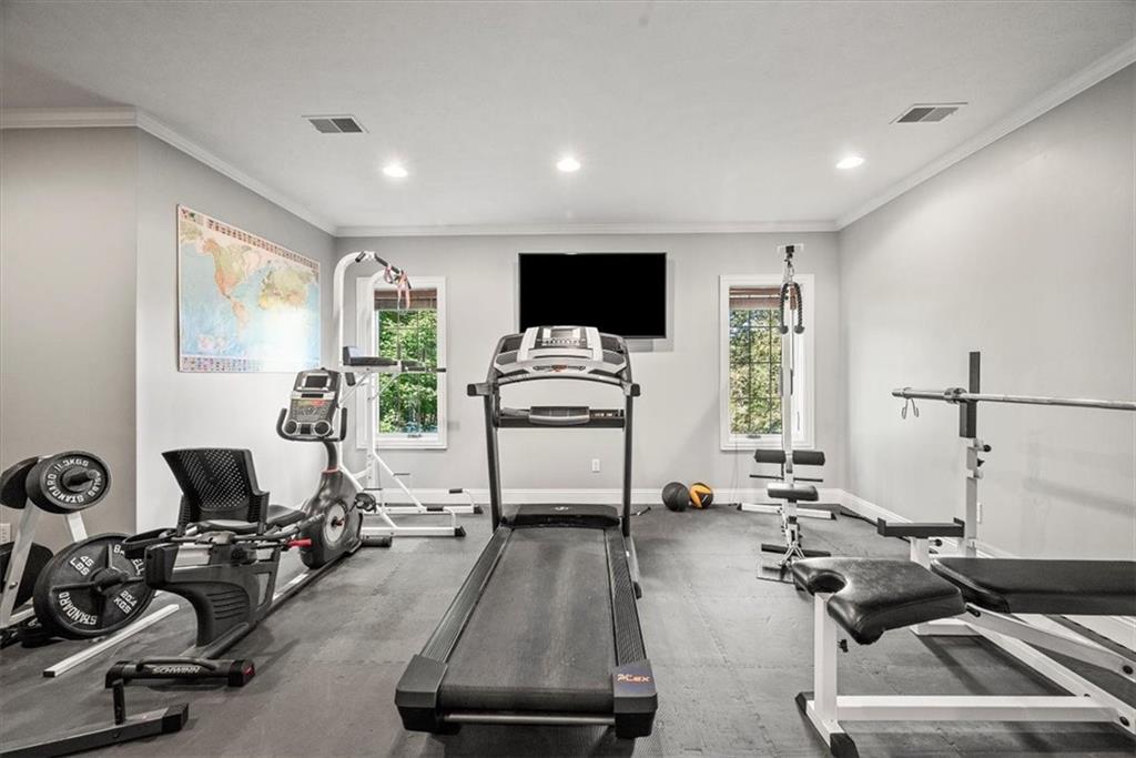 312 Cambridge Drive Mars, PA 16046 - Photo 36 of 50 a living room with furniture and a flat screen tv