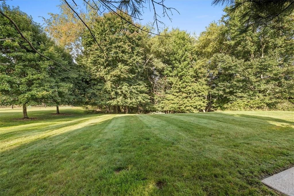312 Cambridge Drive Mars, PA 16046 - Photo 38 of 50 a view of a yard with a trees