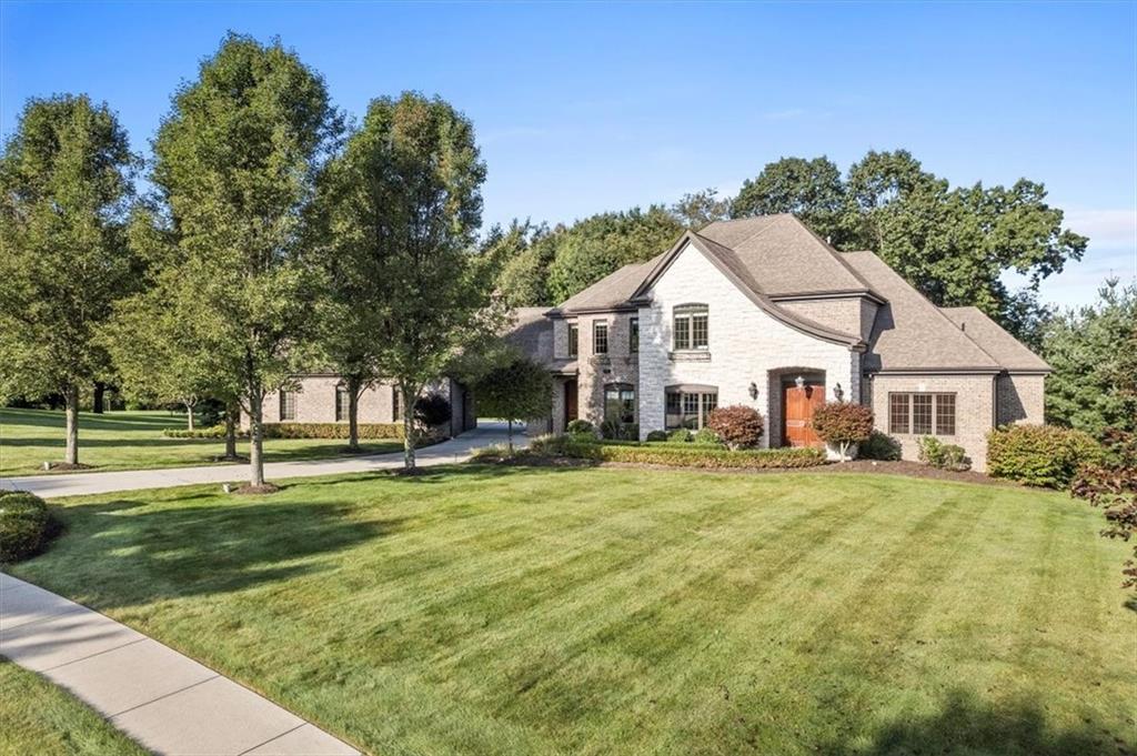 312 Cambridge Drive Mars, PA 16046 - Photo 42 of 50 a view of a house with a big yard and large trees