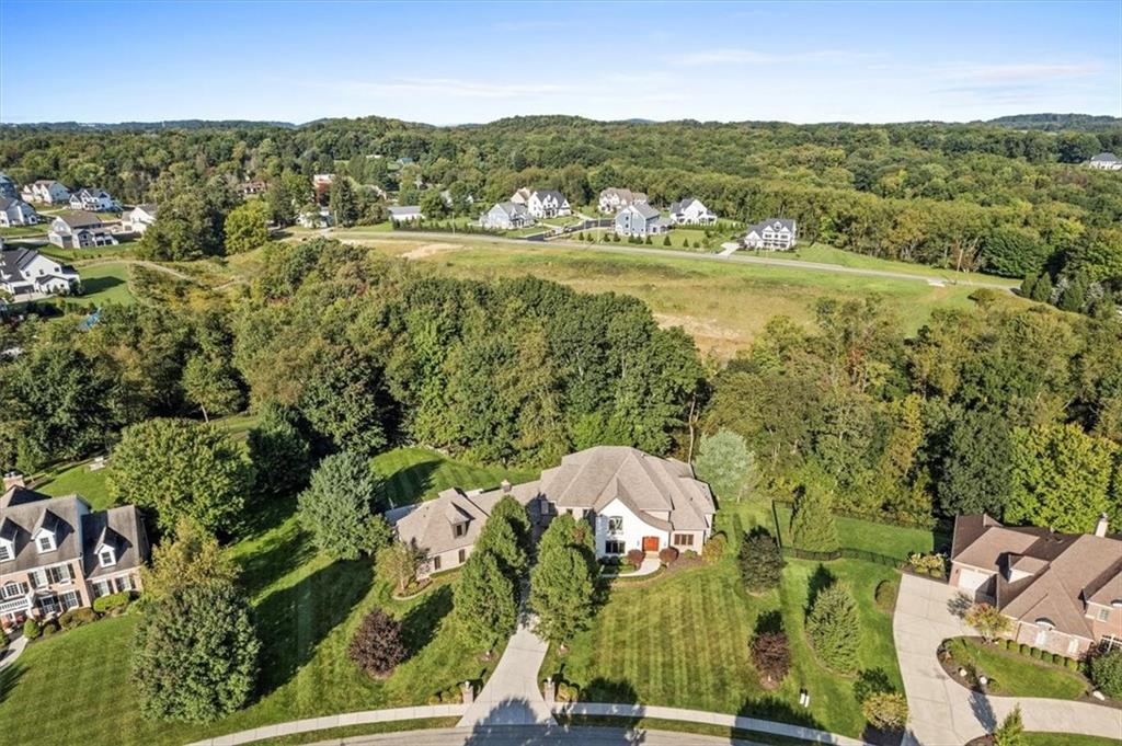 312 Cambridge Drive Mars, PA 16046 - Photo 46 of 50 an aerial view of residential houses with outdoor space and trees