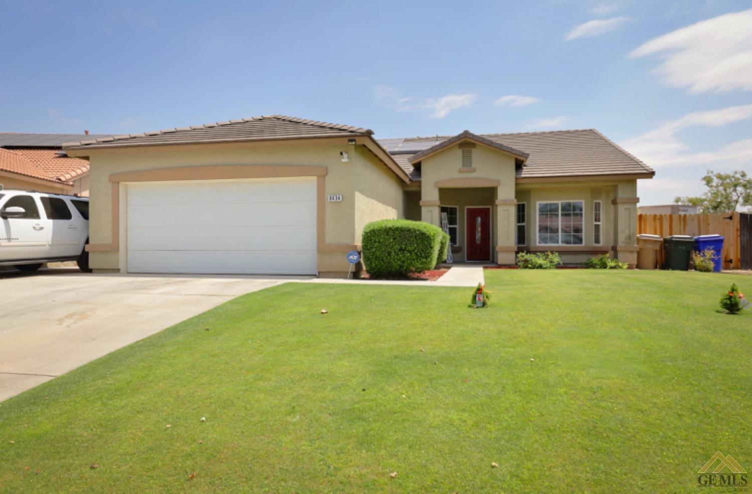 Undisclosed Address Bakersfield, CA 93306 - Photo 2 of 29 a view of a house with a yard and porch