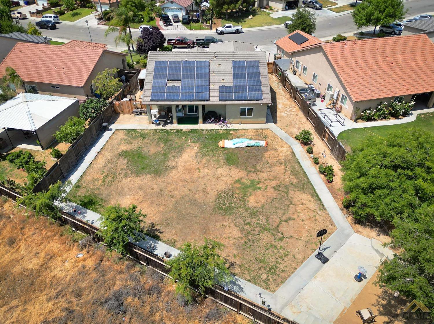 Undisclosed Address Bakersfield, CA 93306 - Photo 28 of 29 an aerial view of a house with swimming pool and outdoor seating