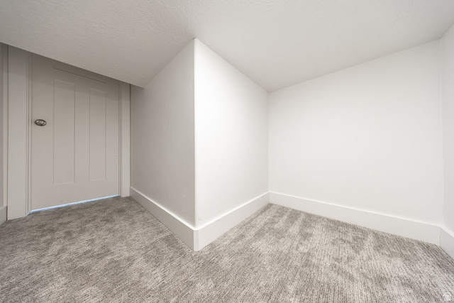 4991 South 475 West Washington Terrace, UT 84405 - Photo 19 of 31 Neutral-toned wall-to-wall carpeting and crisp white walls