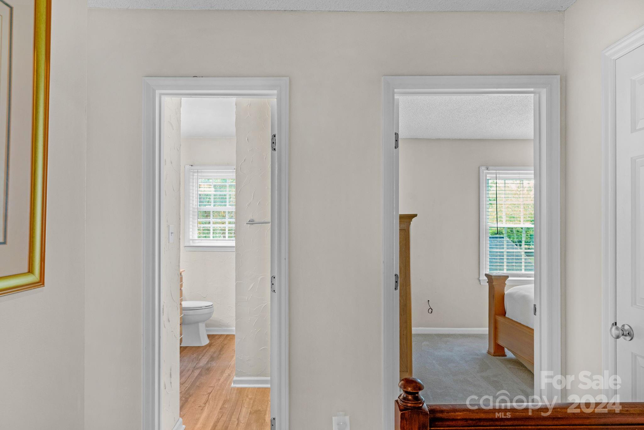 406 Sandymead Road Matthews, NC 28105 - Photo 28 of 48 a view of a bathroom with a shower and a mirror