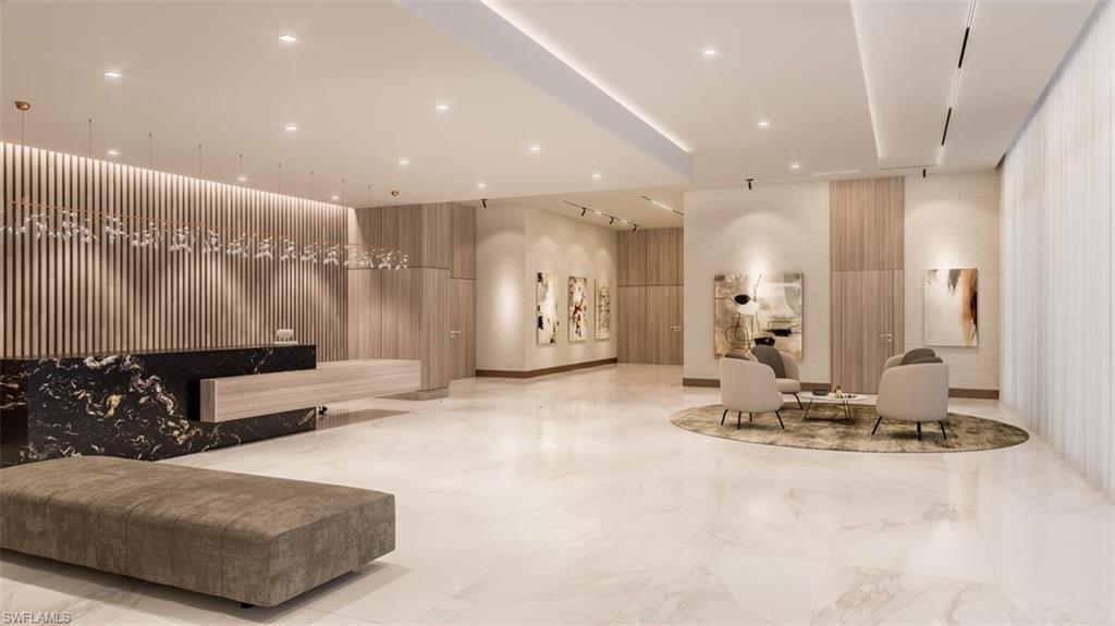 1925 Metropolitan Boulevard, Unit 1106 Naples, FL 34104 - Photo 14 of 21 Community lobby with recessed lighting