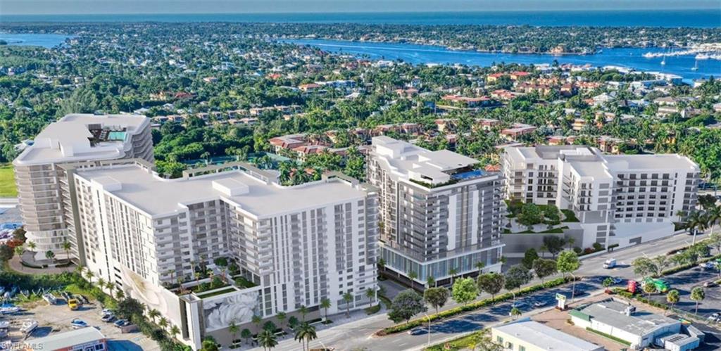 1925 Metropolitan Boulevard, Unit 1106 Naples, FL 34104 - Photo 4 of 21 View of urban area featuring a nearby body of water