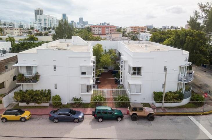 320 80th Street, Unit 15 Miami Beach, FL 33141 - Photo 1 of 18 a picture of car parked on the roadside