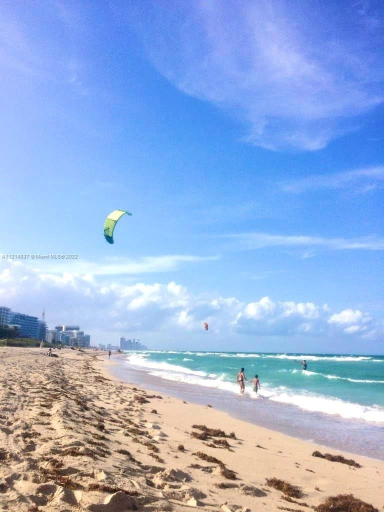 320 80th Street, Unit 15 Miami Beach, FL 33141 - Photo 3 of 18 a view of an ocean beach
