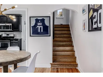a bedroom with a bed and a table in it