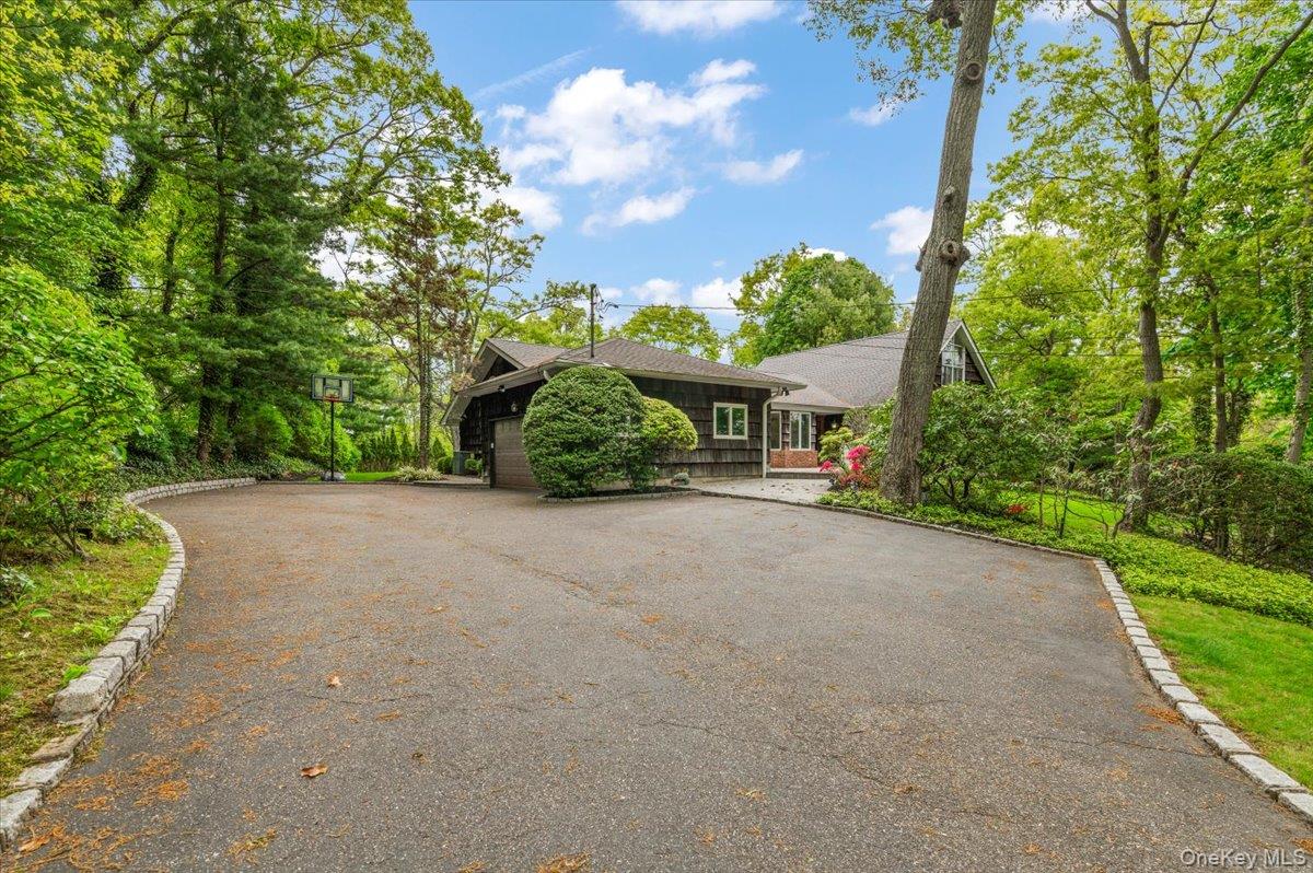 6 Apex Road Melville, NY 11747 - Photo 37 of 50 a view of a house with a street
