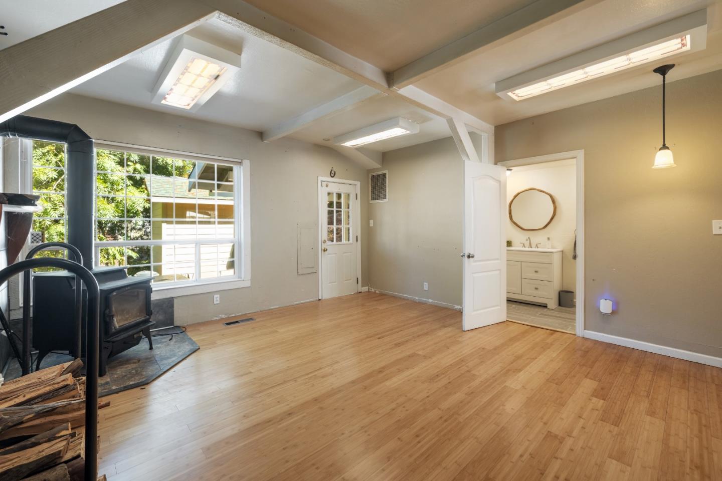 600 Cook Way Ben Lomond, CA 95005 - Photo 15 of 85 a view of livingroom with hardwood floor and workspace